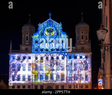 AUGSBURG, GERMANY - OCTOBER 24: Illuminated historic town hall at the festival of lights in Augsburg, Germany on October 24, 2021 Stock Photo