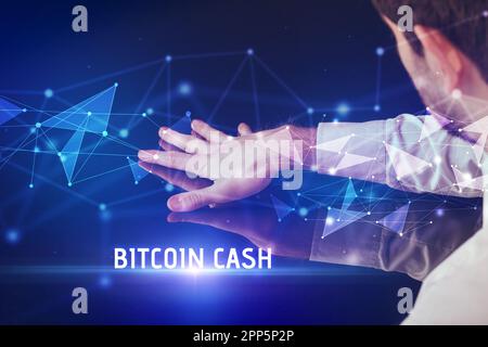 Businessman touching huge screen concept Stock Photo