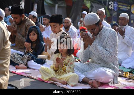 Kolkata, India. 22nd Apr, 2023. Two small girls offer prayers during the special prayer on the occasion of Eid-Ul-Fitr. Eid-Ul-Fitr is a Muslim festival of happiness celebrated all over the world marking the end of the holy fasting month of Ramadan. Credit: SOPA Images Limited/Alamy Live News Stock Photo