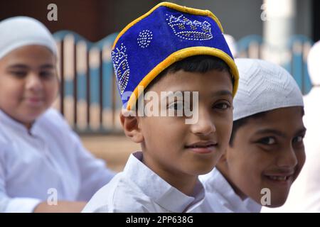 Kolkata, India. 22nd Apr, 2023. Muslim boys of Kolkata wait before the special prayers on the occasion of Eid-Ul-Fitr. Eid-Ul-Fitr is a Muslim festival of happiness celebrated all over the world marking the end of the holy fasting month of Ramadan. Credit: SOPA Images Limited/Alamy Live News Stock Photo
