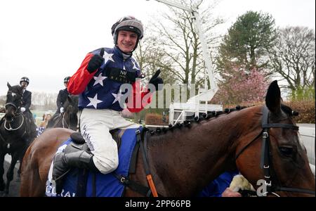 Jockey Jack Tudor celebrates after riding Kitty's Light to victory in the Coral Scottish Grand National Handicap Chase during the Coral Scottish Grand National festival at Ayr Racecourse. Picture date: Saturday April 22, 2023. Stock Photo