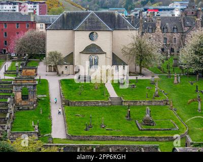 View of rear exterior of Canongate Church and graveyard with old graves, Royal Mile, Edinburgh, Scotland, UK Stock Photo