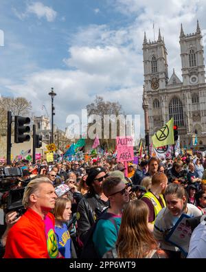 London, UK . 22nd Apr, 2023. Chris Packhan listens to speakers at Extinction Rebellion, The Big one, day 2 ,( saturday). Involved the 'Big One march for biodiversity'which ended with a 'die in'. Members of the 'Red Rebel Brigade 'and 'Green spirits' attended, London United KIngdom Picture garyroberts/worldwidefeatures.com Credit: GaryRobertsphotography/Alamy Live News Credit: GaryRobertsphotography/Alamy Live News Stock Photo