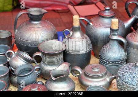 A variety of pottery made by folk craftsmen from clay. Stock Photo