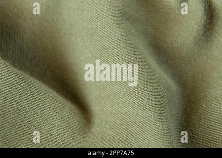 green fabric dress as background macro Stock Photo