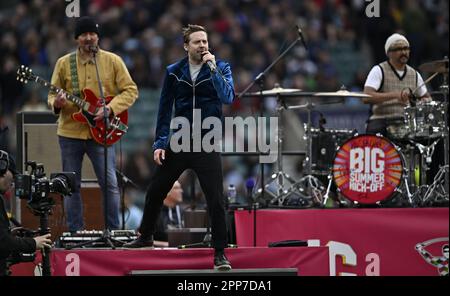 Twickenham, United Kingdom. 22nd Apr, 2023. Premiership Rugby. Harlequins V Bath. Twickenham Stadium. Twickenham. The Kaiser Chiefs. Ricky Wilson (centre), Andrew White (left) and Vijay Mistry (drums) during the Harlequins V Bath Gallagher Premiership rugby match. Credit: Sport In Pictures/Alamy Live News Stock Photo