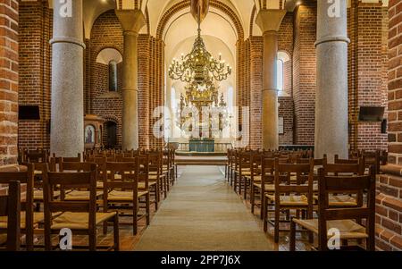 the tall brick nave inside the church of our lady in Kalundborg, Denmark, April 7, 202 Stock Photo