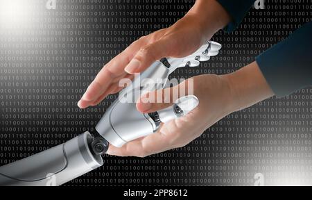Robot and human hands hold and connect on binary code background. Smart AI, Machine learning, Chatbot concepts. Artificial Intelligence for science, e Stock Photo