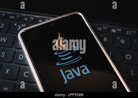 Java Programming language for mobile development, concept. Smartphone on the laptop keyboard. logo java on the mobile phone screen. Barnaul. Russia Ma Stock Photo