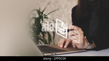 The girl signs an electronic document with a virtual signature. Electronic document Stock Photo