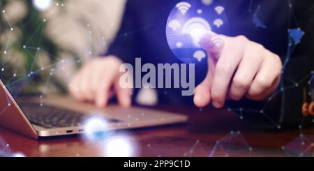 Businessman using laptop with glowing network Stock Photo