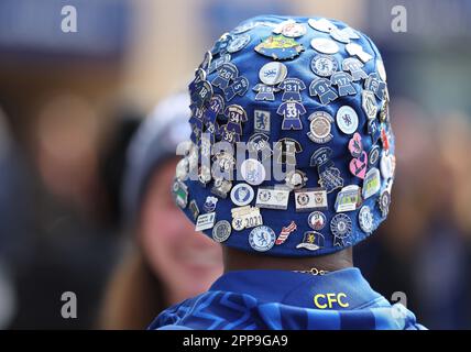 London, UK. 22nd Apr, 2023. A Chelsea fan wears a hat decorated with pin badges during the UEFA Womens Champions League match at Stamford Bridge, London. Picture credit should read: Paul Terry/Sportimage Credit: Sportimage Ltd/Alamy Live News Stock Photo