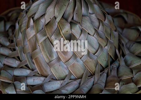 Palm leaf hat closeup, weave, texture,  natural material. Stock Photo