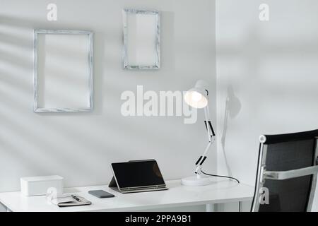 Minimalistic style office desk with tablet computer, smartphone and planner Stock Photo