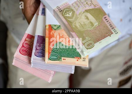 Karachi, Pakistan - April 22, 2023. Pakistani Currency Banknote. Business and Finance concept Stock Photo