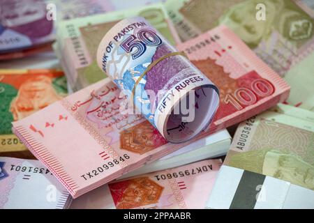 Karachi, Pakistan - April 22, 2023. Pakistani Currency Banknote. Business and Finance concept Stock Photo