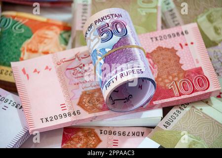 Karachi, Pakistan - April 22, 2023. Pakistani Currency Banknote. Business and Finance concept Stock Photo