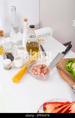 Ingredients making spaghetti white table Stock Photo