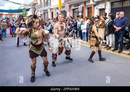 Huelva, Spain - March 18, 2023: man and women dressed and made up in exotic period costume in the parade of Medieval Discovery Fair in Palos de la Fro Stock Photo