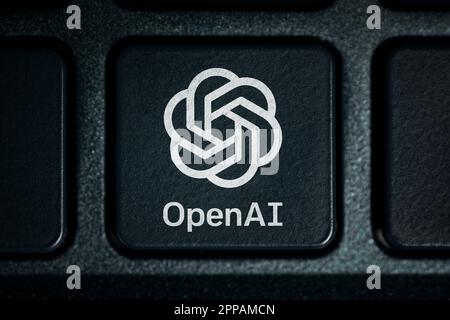 Open AI - American company engaged in the development and licensing of machine learning-based technologies. logo OpenAI on a black keyboard. Barnaul. Stock Photo