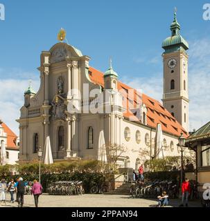 MUNICH, GERMANY - APRIL 4: People at the Heilig-Geist-Kirche church in Munich, Germany on April 4, 2018 Stock Photo