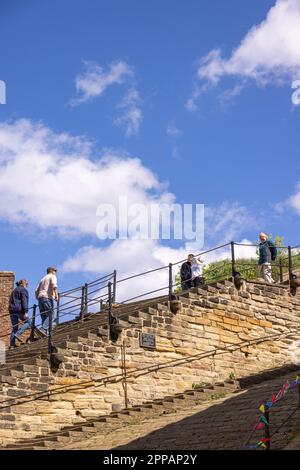 Looking upward to the 199 church steps on Church Lane at Whitby in North Yorkshire. Stock Photo