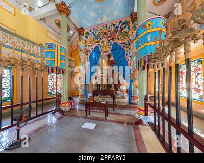 Interior of the Cao Dai temple in Hoi An, Quang Nam province, Vietnam. Cao Dai is a monotheistic syncretic religion that retains many Vietnamese folk Stock Photo