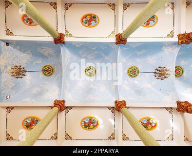 Ceiling of the Cao Dai temple in Hoi An, Quang Nam province, Vietnam. Cao Dai is a monotheistic syncretic religion that retains many Vietnamese folk r Stock Photo