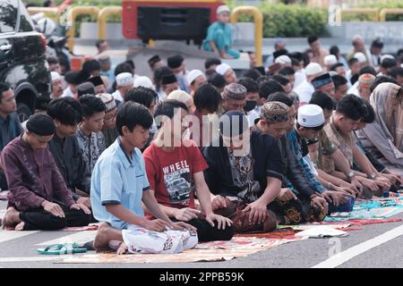 Close-up shot of Muslims performing Eid Prayer on Eid al-Fitr or Eid Mubarak Day. 22 April 2023. Stock Photo