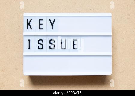 Lightbox with word key issue on wood background Stock Photo
