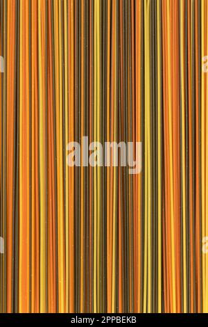 Spaghetti tricolore close up full frame as background Stock Photo