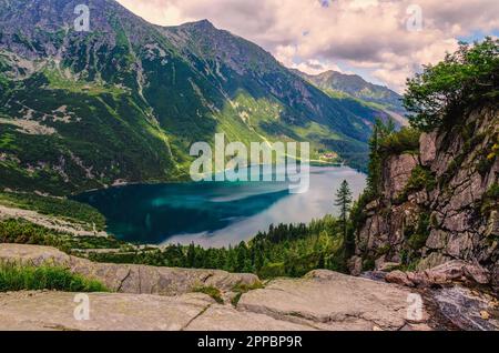 Beautiful postcard view of the Polish mountains. Popular lake Morskie Oko in Tatra National Park, Poland. Stock Photo