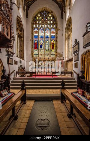The east, stained glass windows (over the altar) at Grade 1 listed parish church of Southwold that is dedicated to St Edmund.. Stock Photo