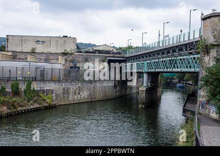 Bath, UK - September 3, 2022: View across the River Avon towards Bath Spa Railway Station on a cloudy afternoon in the autumn. Stock Photo