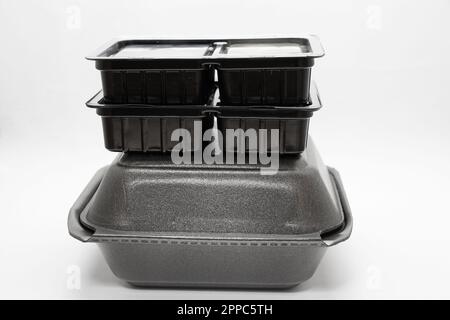 plastic food container with sushi from restaurant on isolated background, takeaway food order Stock Photo