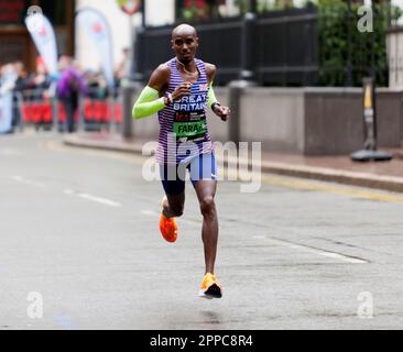 London, UK, 23rd Apr, 2023.  Sir Mo Fara, passing through Cabot Square, in the men's  elite race.  He  went on to finish 9th, in a time of 02:10:28 . Credit: John Gaffen/Alamy Live News. Stock Photo