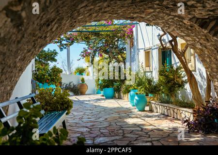 Courtyard of the Theotokos Monastery also known as Paleokastritsa Monastery, Corfu, Greece. Theotokos Monastery, Paleokastritsa town. Monastery of Vir Stock Photo