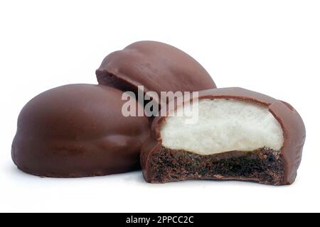 Chocolate cake covered with marshmallows isolated on white background high quality details Stock Photo