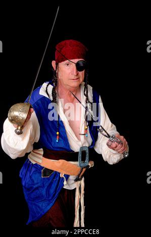 Pirate isolated on black with a cutless Stock Photo