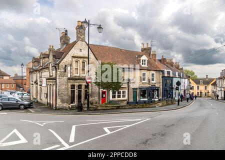 MALTON, NORTH YORKSHIRE, UK - APRIL 22, 2023.  Street view of small and independent shops and stores in the North Yorkshire market town of Malton, UK Stock Photo