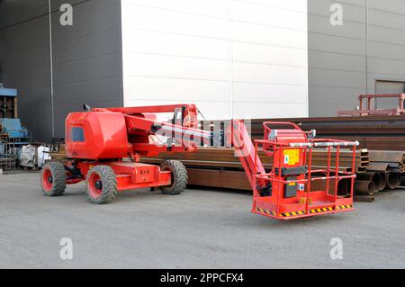 Modern construction hydraulic lift. Air basket. Industry Stock Photo