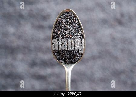 Top view of poppy seeds on a spoon Stock Photo