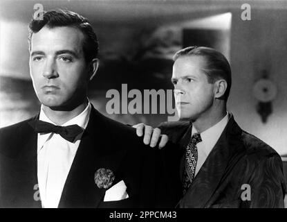 JOHN PAYNE and DAN DURYEA in LARCENY 1948 director GEORGE SHERMAN novel Lois Eby and John Fleming music Leith Stevens Universal International Pictures (UI) Stock Photo