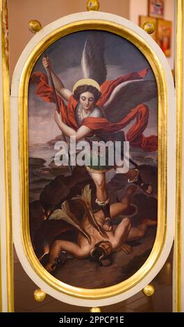 An Icon of Saint Michael the Archangel defeating the Devil. The Greek-Catholic Church of the Dormition of the Mother of God in Čemerné, Slovakia. Stock Photo