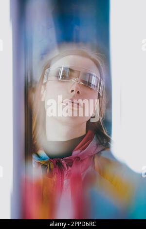 Young woman wearing futuristic glasses Stock Photo