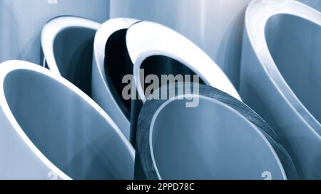 PVC pipes bacground, background of big plastic pipes used at the building site. Stock Photo