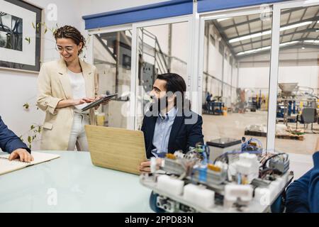 Businessmen and businesswoman having discussing in meeting Stock Photo