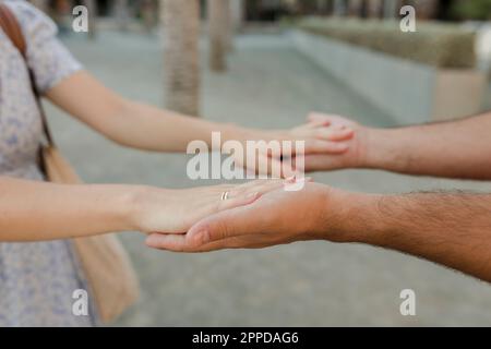 Man with woman giving high-five Stock Photo