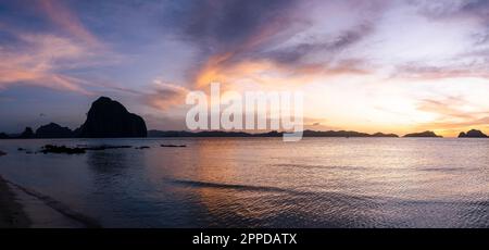 Tranquil view of sunset over calm sea Stock Photo