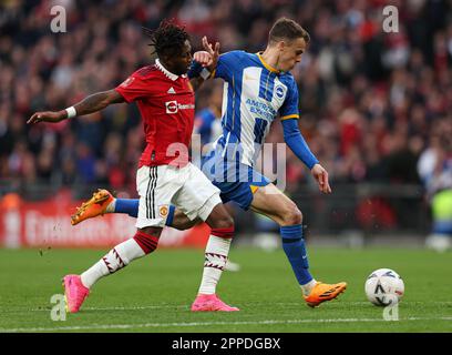 London, UK. 23rd Apr, 2023. Fred of Manchester United (left) and Solly March of Brighton and Hove Albion (right) battle for the ball during the The FA Cup match at Wembley Stadium, London. Picture credit should read: Kieran Cleeves/Sportimage Credit: Sportimage Ltd/Alamy Live News Stock Photo